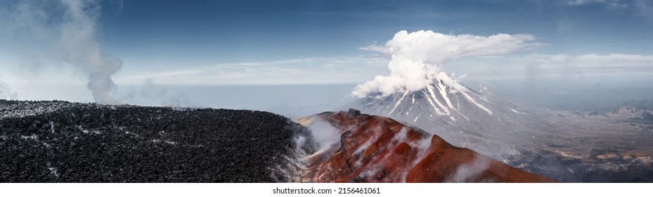 Panorama of Koryaksky volcano, view from Avachinsky volcano top, black stones of solidified lava, Kamchatka - Shutterstock ID 2156461061