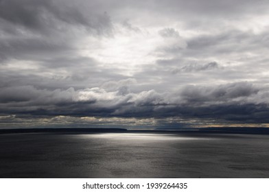 Panorama of the lake before the rain. Thunderclouds over the lake. - Shutterstock ID 1939264435