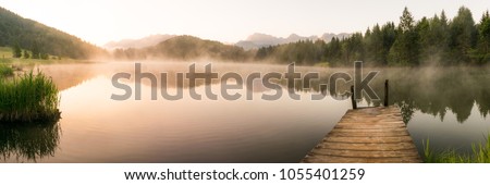 Panorama of lake Geroldsee in the Alps of Bavaria on a summer morning