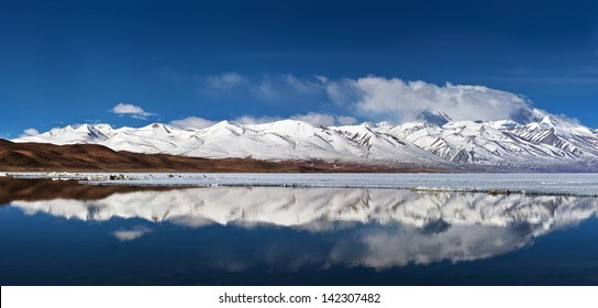 Panorama of Lake Manasarovar (Mapam Yumco), Western Tibet. According to the Hindu religion, the lake was first created in the mind of the Lord Brahma after which it manifested on Earth