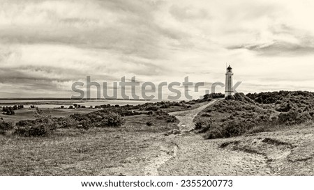 Panorama of the landscape on the island of Hiddensee, located in the Baltic Sea, with the lighthouse Dornbusch, Germany, sepia toned