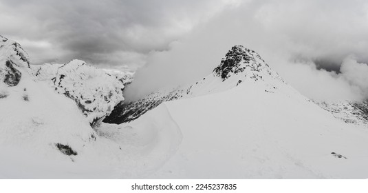Panorama from Liliowe pass to Beskid peak in winter aura. Poland. Europe