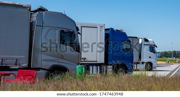 Panorama\
Logistics truck on the motorway rest\
area
