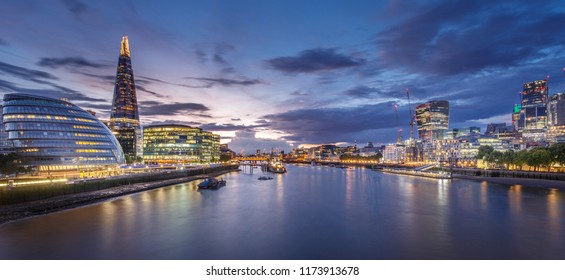 A panorama of the London skyline over the river Thames an night
