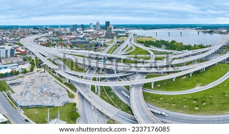 Panorama Louisville city criss crossing roads, Ohio River, skatepark, baseball diamond aerial