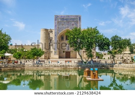 Panorama of Lyab-i Hauz, an architectural ensemble of buildings 16-17 centuries in the center of Bukhara, Uzbekistan. Khanqah of Divan-begi is on background