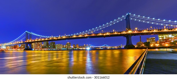 Panorama Of Manhattan Bridge In New York City At Night