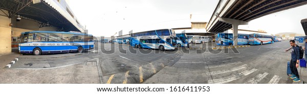 Panorama many bus park\
at bus gate waiting for passengers. Mochit Terminal, Bangkok\
Thailand Date 12 Jan\
2020