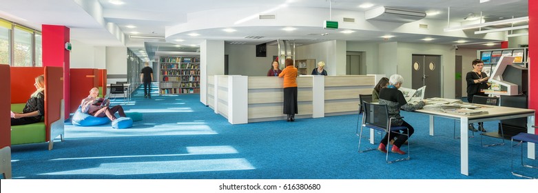 Panorama Of Modern And Spacious University Library With Blue Carpet On The Floor