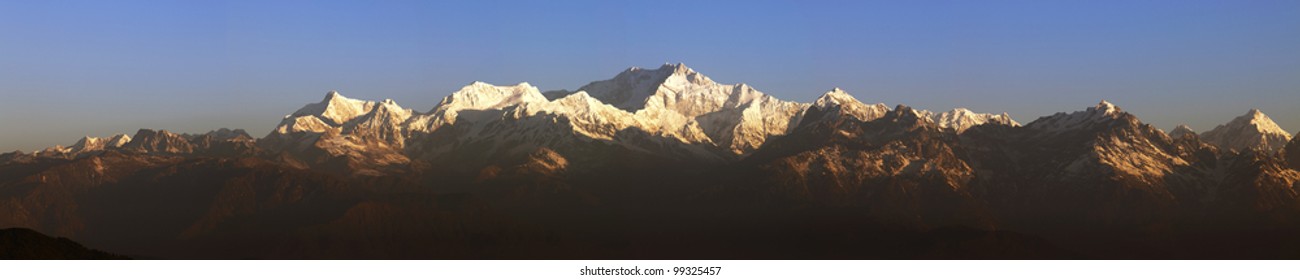 Panorama of Mount Kanchenjunga from Tiger Hill Darjeeling at sunrise.