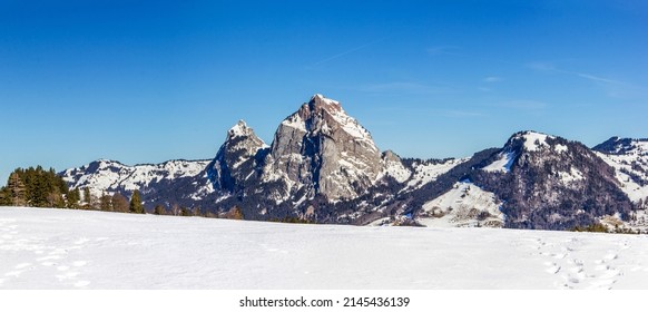 Panorama of Mount Mythen (Gross and Klein) covered with snow in winter viewed from Stoos, Canton Schwyz.