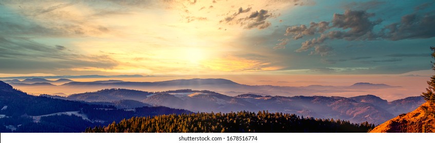 Panorama of the mountain landscape in the Northern Black Forest at sunrise