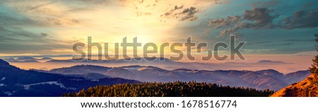 Panorama of the mountain landscape in the Northern Black Forest at sunrise