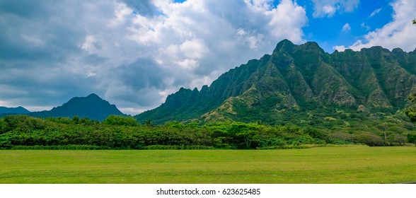 Panorama of the mountain range by Kualoa Ranch in Oahu, Hawaii. Famous movies and TV shows like "Lost", "50 First Kisses" and "Jurassic Park" were filmed here