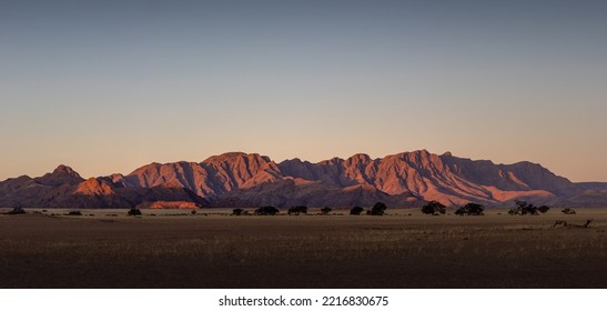 Panorama Of Mountain Range During Sunset, Red Glow Golden Light, Sossusvlei National Park