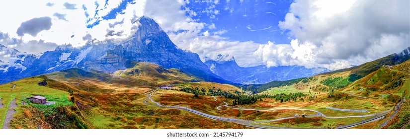 Panorama of a mountain valley under the clouds. Mountain panorama. Mountain valley panoramic landscape. Mountain panoramic landscape - Shutterstock ID 2145794179