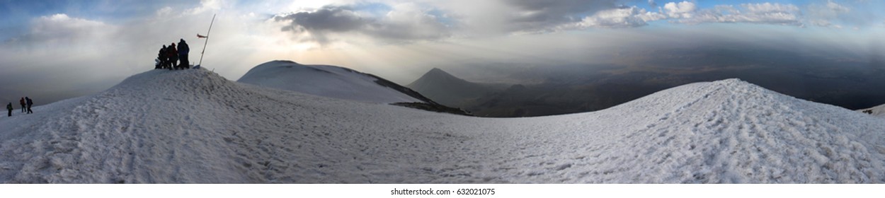 Panorama With Mountaineers At Their Goal: The Snow Covered Summit Of Mount Ararat With Kucuk Agri Dagi In The Background, Igdir Province, Turkey