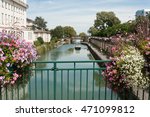 panorama of Mulhouse in Alsace with picturesque channel and flowers