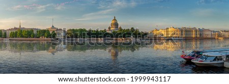 Panorama with the Neva River, Admiralty Embankment and St. Isaac's Cathedral in St. Petersburg