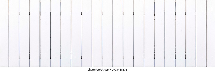 Panorama of New white vintage wood slat fence pattern and background seamless