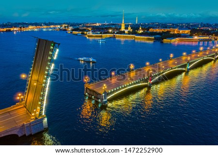 Panorama of the night of Petersburg. Bridges Of SPb. Rivers Of SPb. Neva river at night. Trinity bridge. Rising of the bridge. Top view of the bridge. Evening walks on the Neva. Impressions of Russia