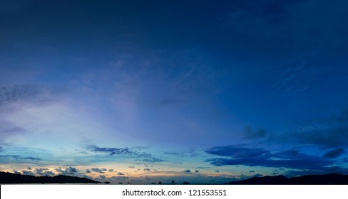 Panorama Of Night Sky Clouds Above The Tropical Sea Harbor 