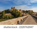 Panorama of the Old bridge and the historical center of French town of Beziers.