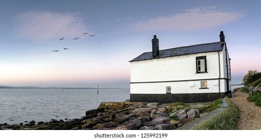 Panorama Of An Old House On The Beach At Lepe In The New Forest.