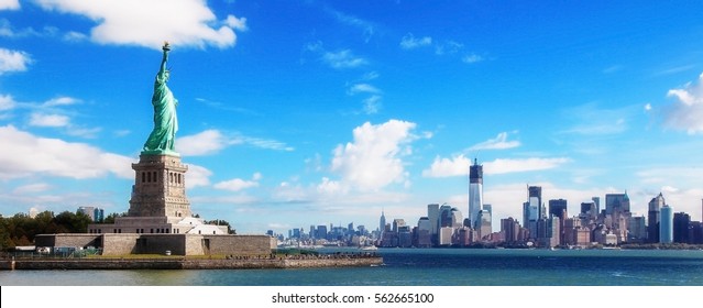 Panorama on the Statue of Liberty and the Skyline of Manhattan, New York City, United States - Shutterstock ID 562665100