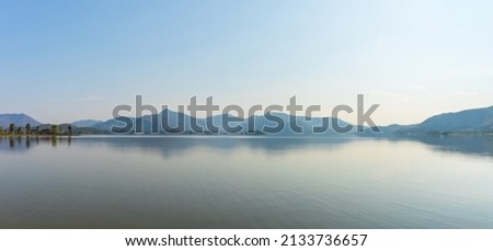 Panorama or panoramic landscape photo of Lake and mountain at day time.