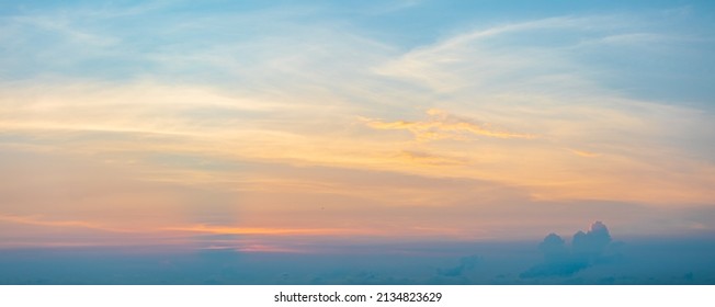 Panorama photo of clouds or cloudscape at sunset or evening time. with blue sky. - Shutterstock ID 2134823629