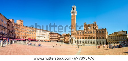 Panorama of Piazza del Campo (Campo square), Palazzo Publico and Torre del Mangia (Mangia tower) in Siena, Tuscany, Italy