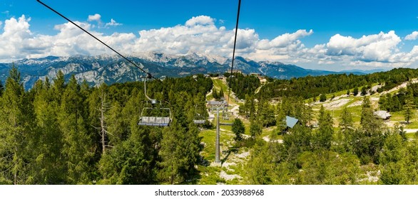 A panorama picture of the landscape of the Triglav National Park, as well as the ski lifts, as seen from the Vogel ski resort.