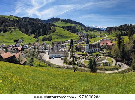 panorama picture of the small fischenthal in switzerland. lush green hills in the zurich oberland. recreation area swiss
