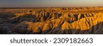 Panorama from Panorama Point Overlook in the Badlands National Park during golden hour. 

