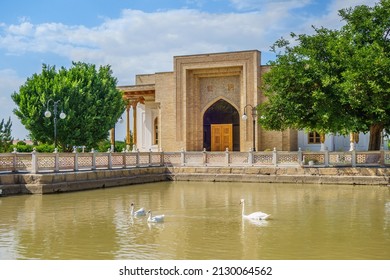 Panorama of pond and park in the center of the architectural ensemble of the mausoleum of Bahauddin Nakshband, Bukhara, Uzbekistan - Shutterstock ID 2130064562