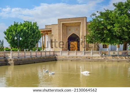 Panorama of pond and park in the center of the architectural ensemble of the mausoleum of Bahauddin Nakshband, Bukhara, Uzbekistan