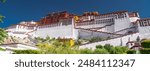 Panorama of Potala Palace, Tibet (China, Asia). Fantastic photo of the mighty palace of the Dalai Lama. Blue sky, clouds, extremly colorful. Potala Palace is an Unesco World Heritage. Located in Lhasa