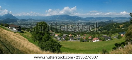panorama with Rhine valley and the mountains from Austria and Liechtenstein, the city of Feldkirch and Rankweil. beautiful panoramic view on summer day with blue sky and little bit of clouds