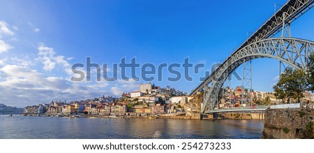 Similar – Blonde woman looks at bridge in Porto