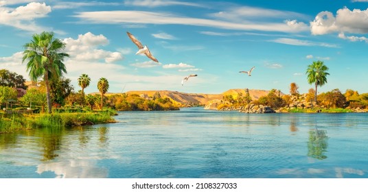 Panorama river Nile and boats at sunset in Aswan - Shutterstock ID 2108327033