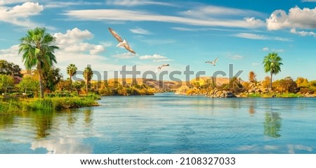 Panorama river Nile and boats at sunset in Aswan