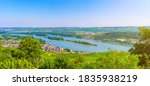 Panorama of river Rhine Gorge or Upper Middle Rhine Valley winemaking region with vineyards green fields near Rudesheim am Rhein town, Rhineland-Palatinate, Germany. Panoramic view of Rhein valley