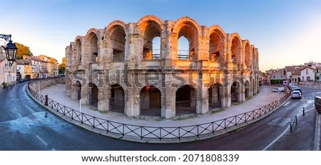 Panorama of roman Roman Amphitheatre and arena at sunrise, Arles, Provence, southern France