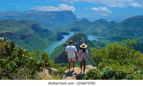 Panorama Route South Africa, Blyde river canyon with the three rondavels, view of three rondavels and the Asian women and Caucasian men on vacation in South Africa