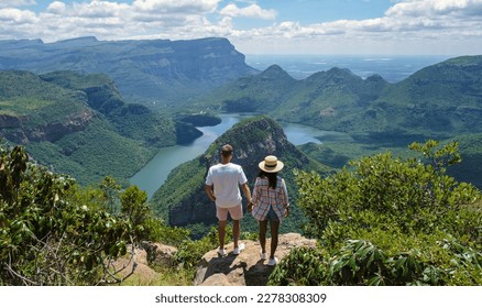 Panorama Route South Africa, Blyde river canyon with the three rondavels, view of three rondavels and the Blyde river canyon in South Africa. Asian women and Caucasian men on vacation in South Africa - Powered by Shutterstock