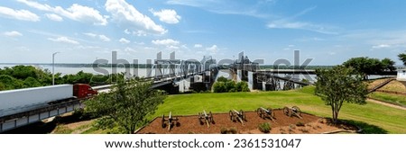 Panorama row of canons display at historic Vicksburg battlefield overlooking twin old new bridges across Mississippi River, artillery during siege of civil war, Mississippi, USA. Interstate 20, US 80
