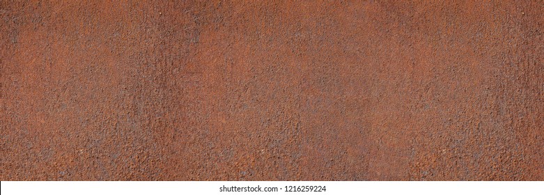 Panorama of rusty metal wall, old sheet of iron covered with rust and corrosion paint. Oxidized iron panel. Texture or background.