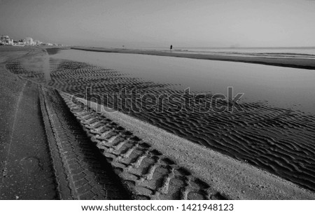 Similar – Fahrwasser Ebbe See Meer