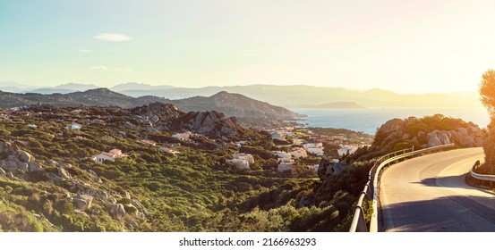 panorama of Sardinia coast at sunset, with curvy road. High quality photo